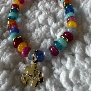 Stretchable Bracelet with 'Unique' Puzzle Charm for Autism Awareness